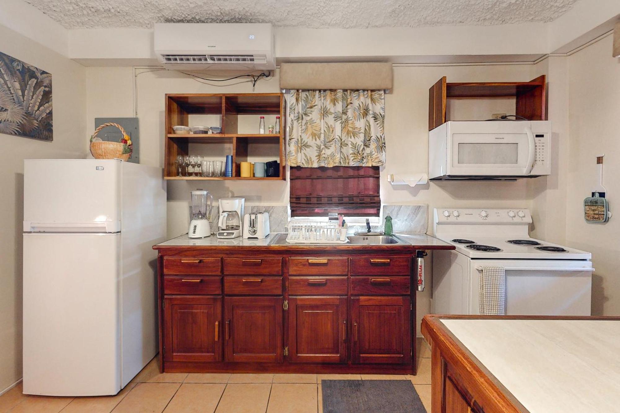 Hummingbird Home Suites San Pedro  Rum bild
