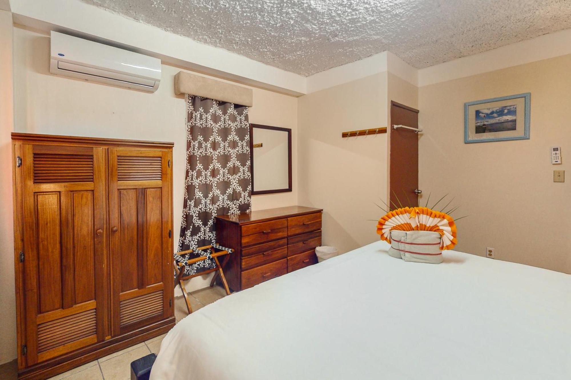 Hummingbird Home Suites San Pedro  Rum bild